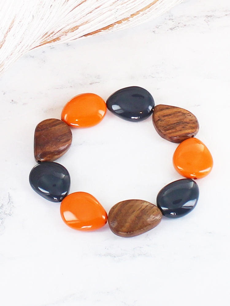 Suzie Blue JP1308 Orange Wood and Resin Pebble Elasticated Bracelet