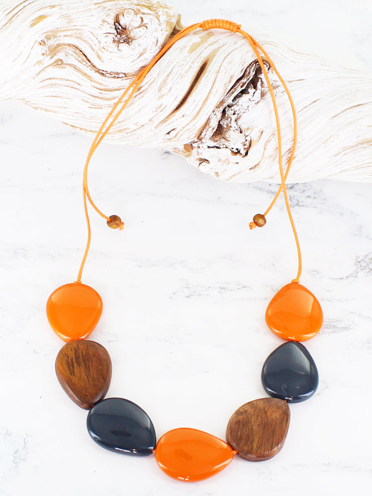 Suzie Blue JP1307 Orange Wood and Resin Pebble Necklace