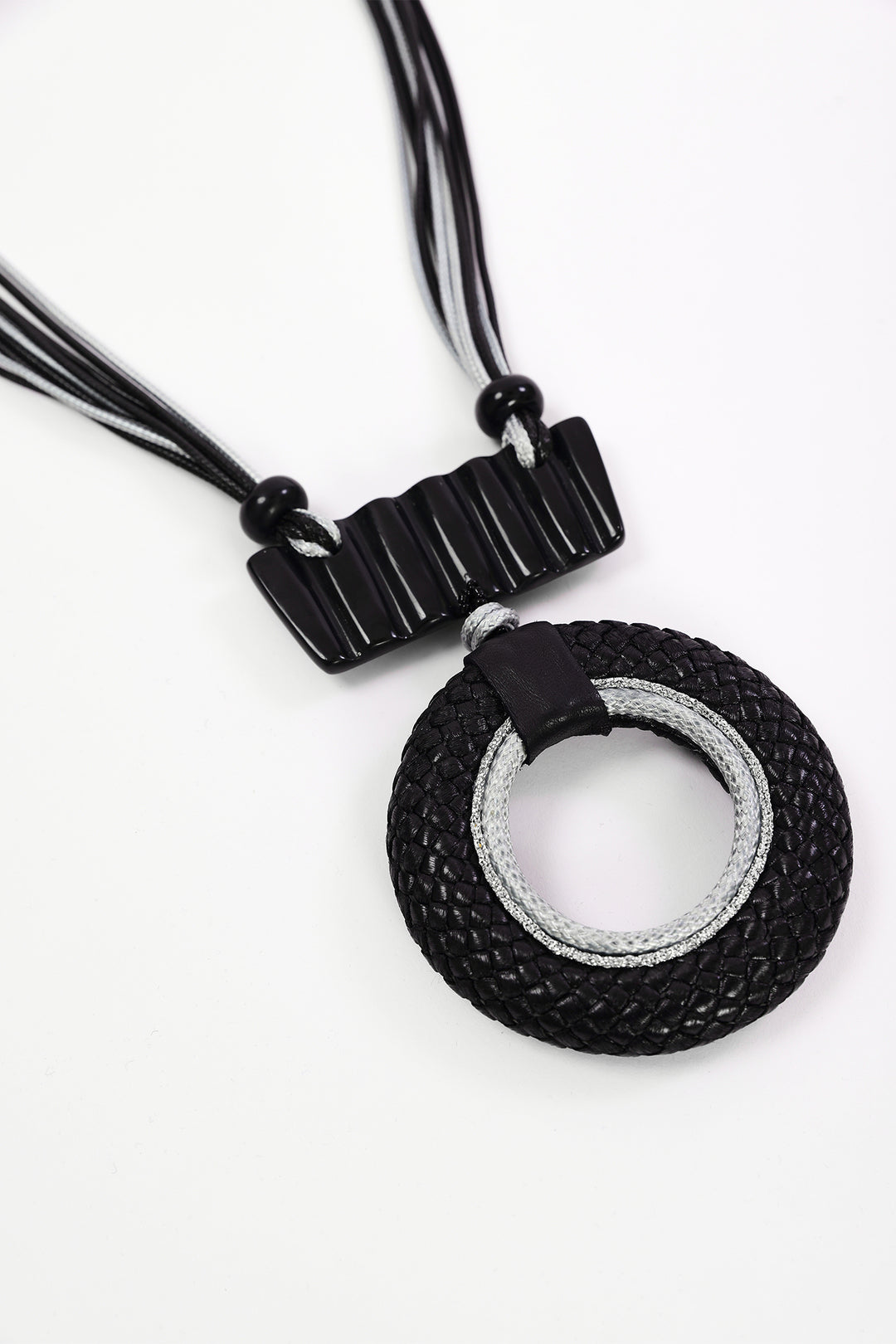 Naya Black/Silver Leather Look Circle Necklace With Bar Trim, styled
