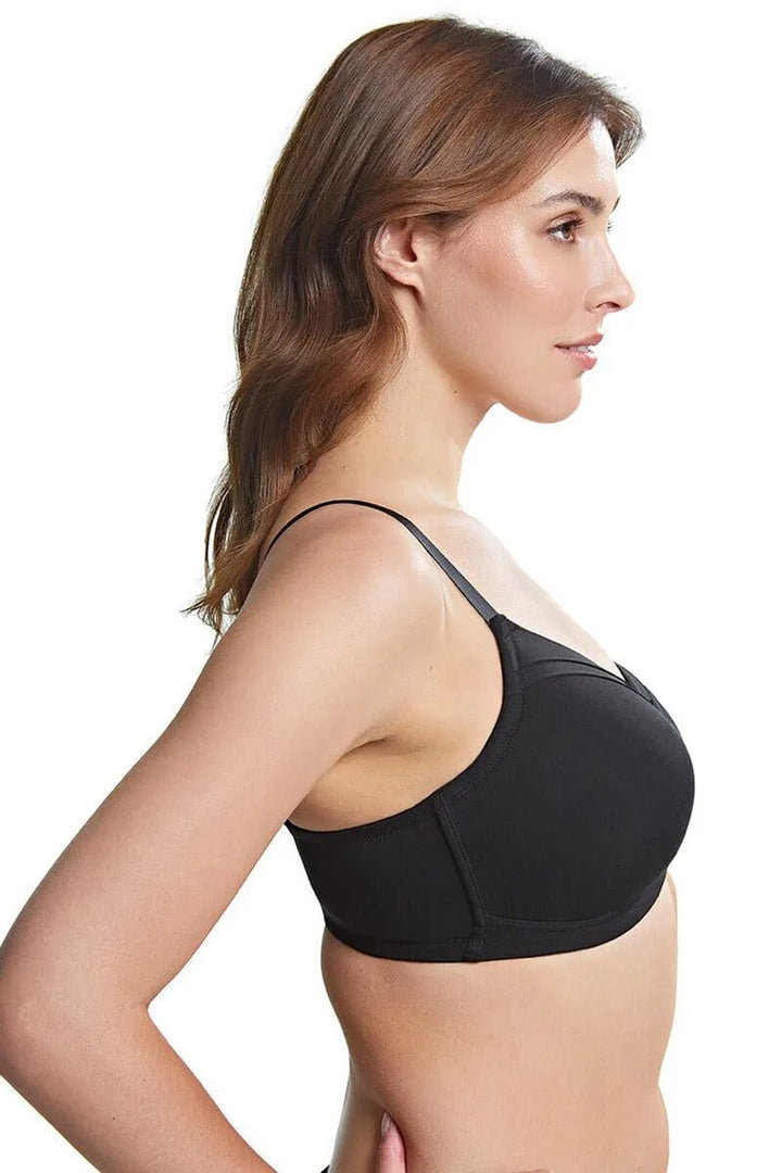 Woman wearing a black bra on a white background