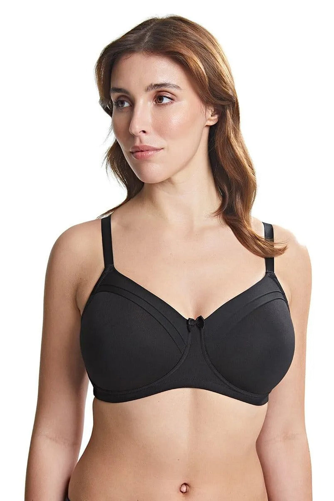 Woman wearing a black bra on a white background