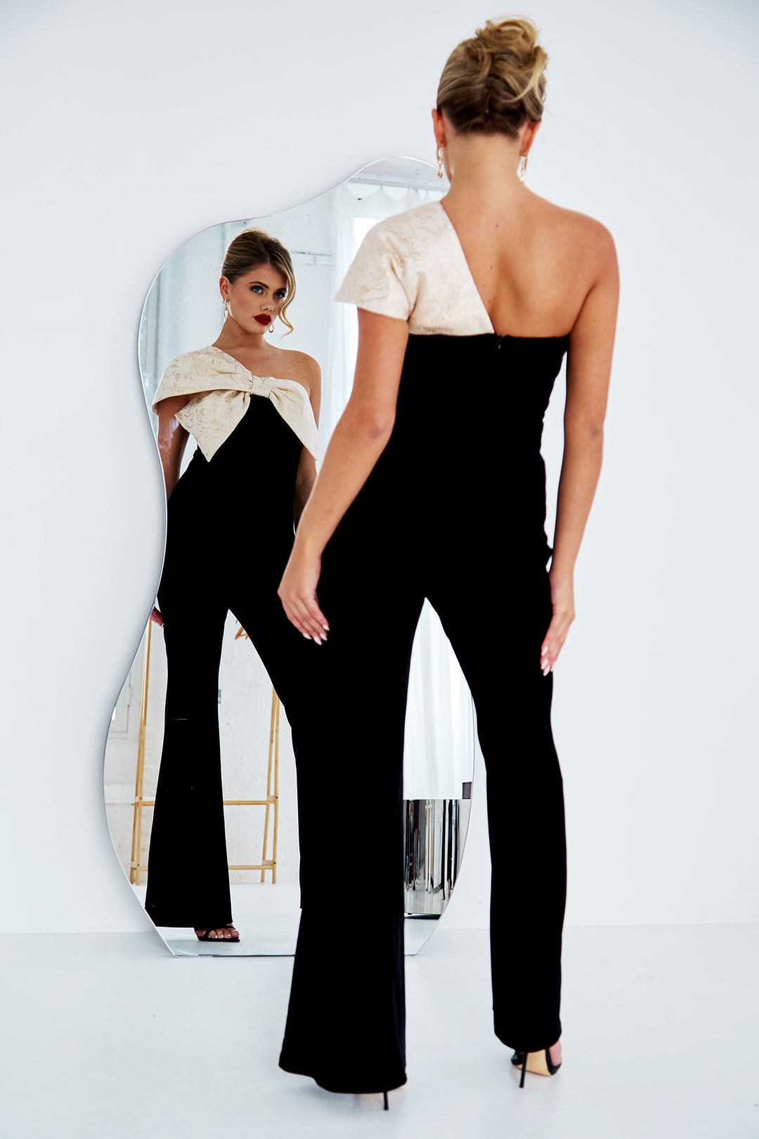 The 8th Sign Baroque Black Gold Bow Jumpsuit, back with mirror